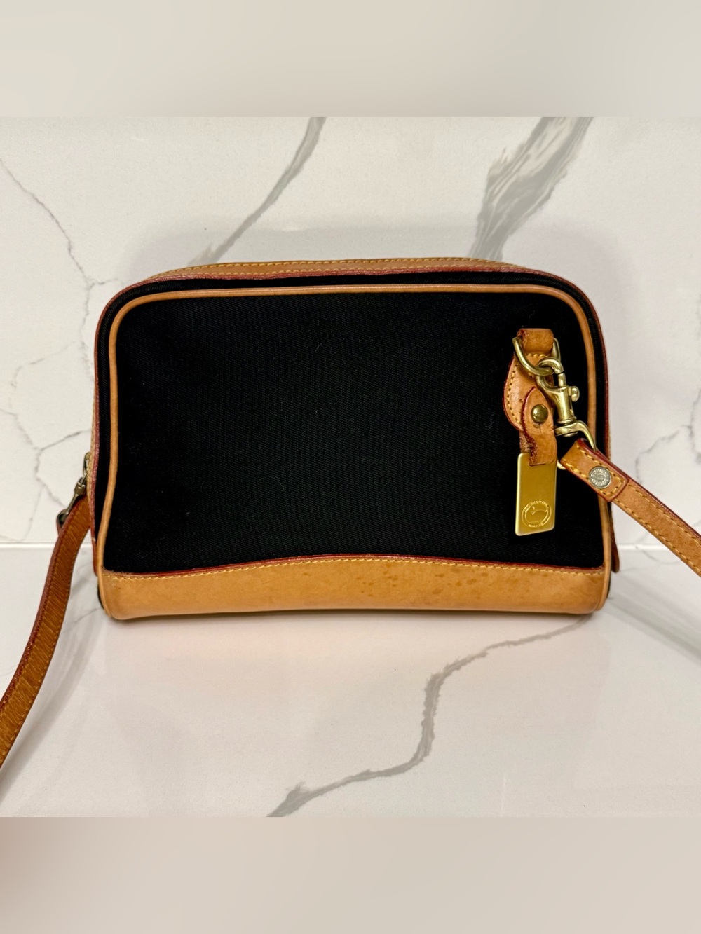 Vintage Dooney & Bourke
Cabriolet Camera Crossbody Bag
Black Canvas USA Made